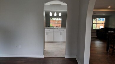 View of kitchen and eating area from front entranc