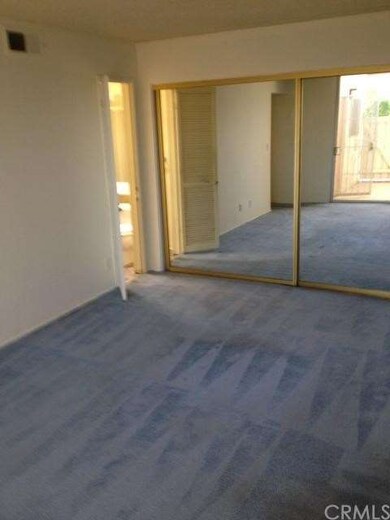 Master Bedroom with Wall-Length Closet and Sliding
