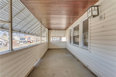 View of patio / terrace featuring a balcony and a residential view
