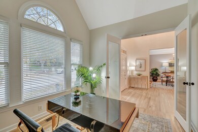 Notice the glass french doors installed for privacy. Along with the vaulted ceiling and the gorgeous floors you will enjoy being in the office as long as need be