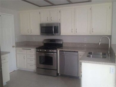 great kitchen open to family room and door to form