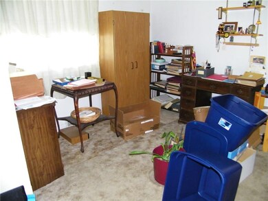 Good sized second bedroom currently used for stora