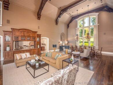 Great Room with soaring ceilings, beautiful beam w