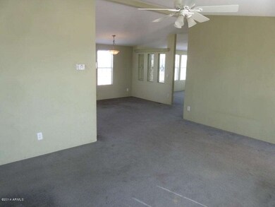 Living room with view to dining & family
