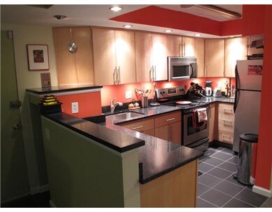 Kitchen. Black quartz counters;recessed & undercou