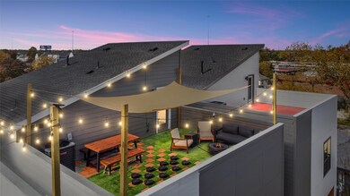Expansive rooftop deck ideal for entertaining and