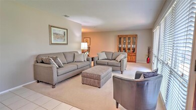 Living room is flooded with natural light