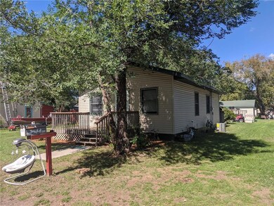 Side view of home from street - roof is approx. 5 