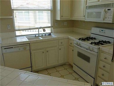 Spacious kitchen, with Island. Nice window looking