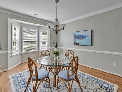 Formal dining room with crown and chair rail and s