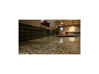 Custom Finishes with Granite, tile back splash & u