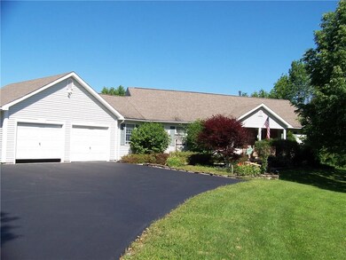 This summer view shows the extensive landscaping. 