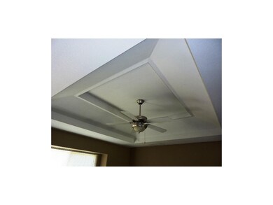 Vaulted ceiling in living room and master bedroom