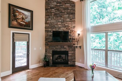 The door off of the living room leads to the wrap around deck.