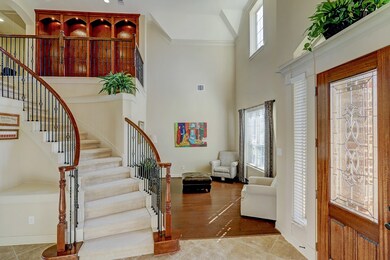 Spectacular Staircase With Wrought Iron Spindles!
