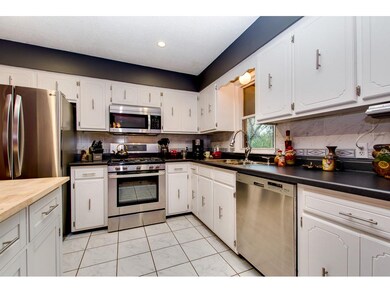 Kitchen with new SS appliances, counters, SS sink 