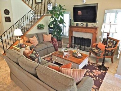 View of living room and fireplace.