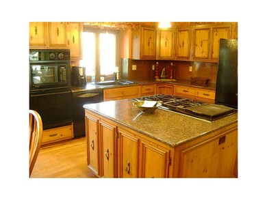 Kitchen. Granite - Wood Floors