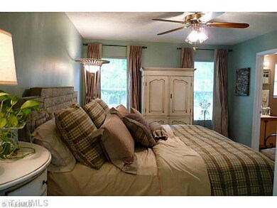 Master Bedroom. The wall color in this large master bedroom sets the tone for relaxing moments and peaceful slumbers... You will love the large Walk-in Closet, too!