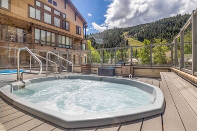 Common Hot Tubs on large sun deck with amazing ski