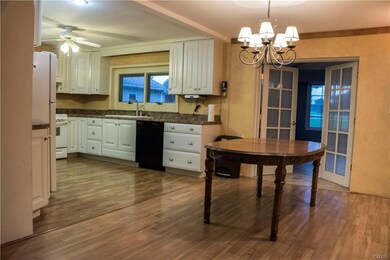 Dining area with built in shelves (not pictured)