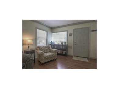 Enter from the darling covered front porch into th