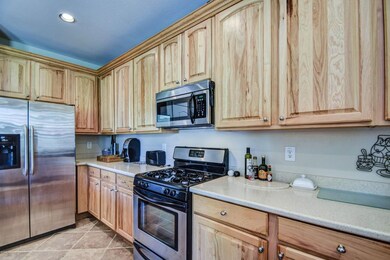 Gas Stove & Oak Cabinets