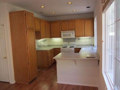 High ceilings and large windows make the kitchen l