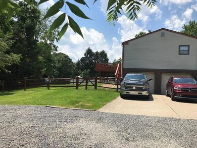 Two brand new automatic Garage Doors and so much p