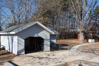 Detached garage with additional shop area attached