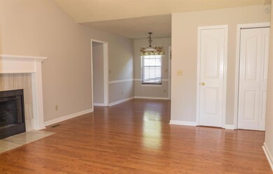 Living room opens to the dining room for ease of entertaining.