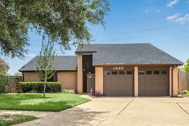 Welcome home! This updated 3/2/2 is nestled on a q