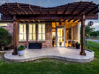 View of patio / terrace with lovely pergola.