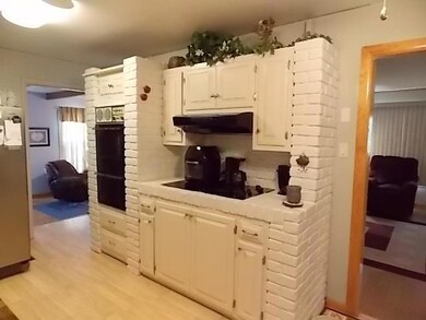 Cute Country Kitchen with double ovens.