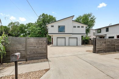 View of side of home featuring an attached garage