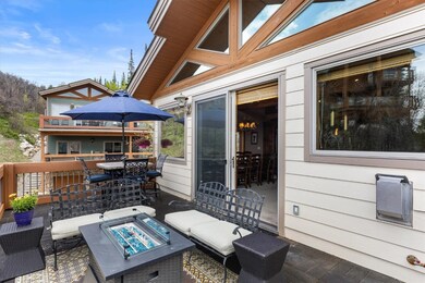 Great outdoor living with glass rock firepit