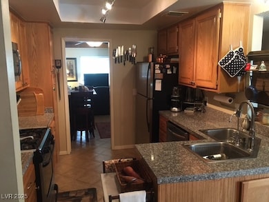 Kitchen featuring light tile patterned flooring, s