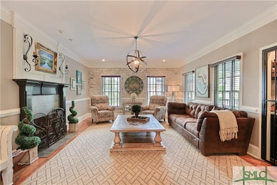 Open Living Area featuring Exposed Brick Wall,  We
