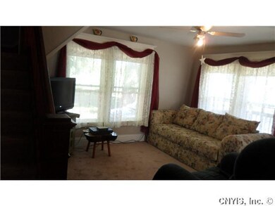 Living Room. New carpet but does have hardwood und