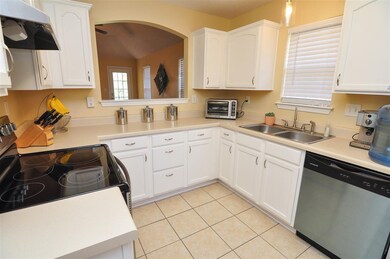 The kitchen comes equipped with stainless steel ap