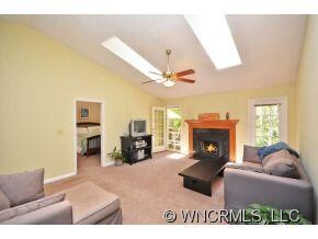 Vaulted living with fireplace.