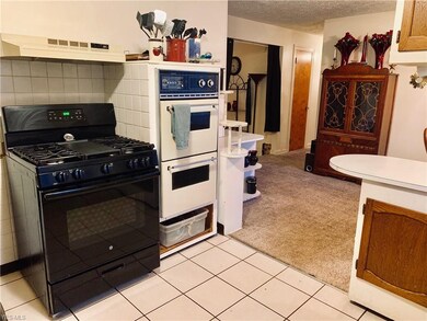 Look at how adorable this double oven is! Both the stove and oven remain w/the sale of the home!