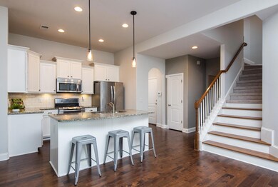View of the stairs leading to the   Bonus Room, 4th Bedroom, Full Bath, and walk in storage.