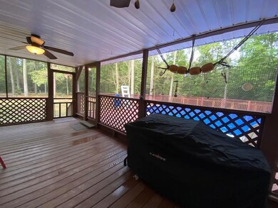 LARGE screened in porch off kitchen and pool area