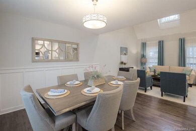 Check out the board and batten trim in the dining 