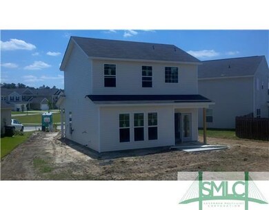 Exterior Back. Spacious Back Yard with Patio.