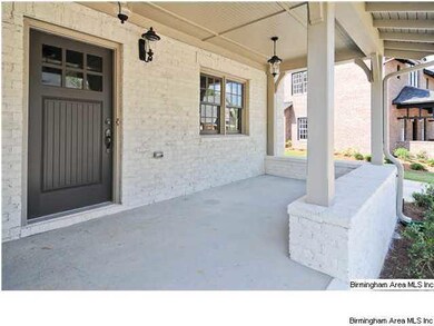 Great front porch to enjoy the community and stree