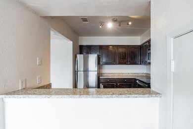 Kitchen featuring appliances with stainless steel 