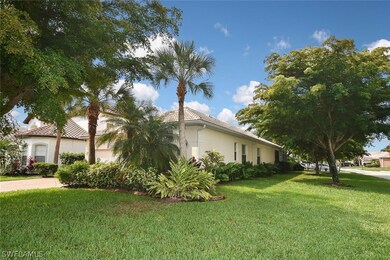 Sideyard setback view. Lush Florida landscaping.