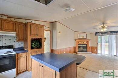 Kitchen Open to Den
